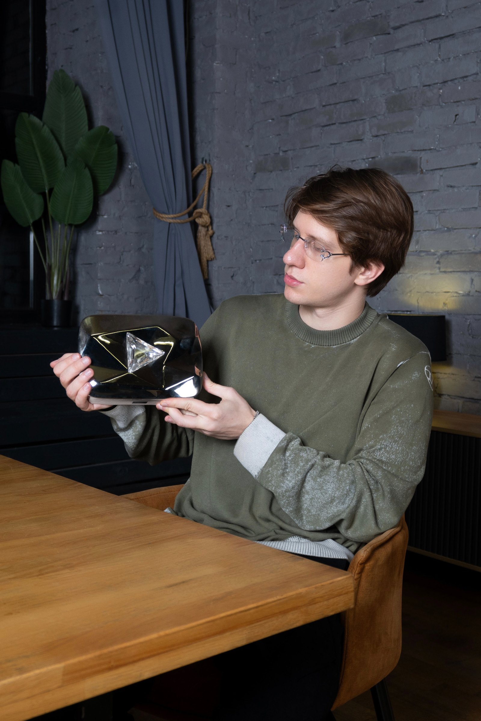 Nikita Britikov with the YouTube Silver Play Button